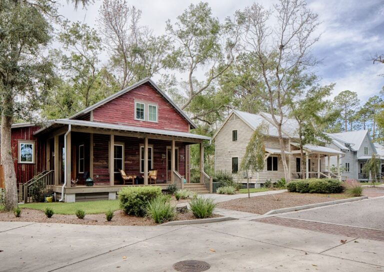 Historic Southern-style homes with front porches and bare trees