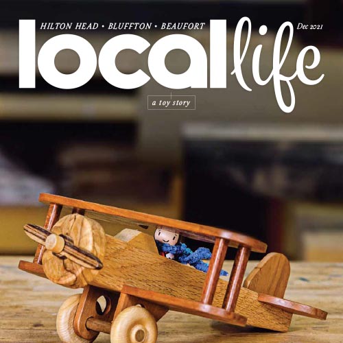 Local Life magazine cover with close-up of wooden toy truck.