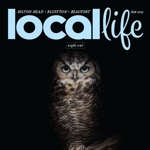Local Life magazine cover featuring an owl against a black background.