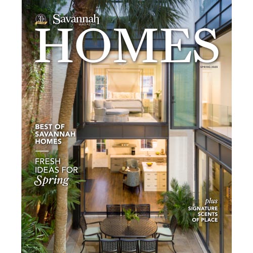 Magazine cover of Savannah Homes with kitchen and glass wall interior.