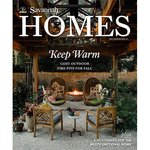 Magazine cover of Savannah Homes with cozy outdoor fireplace scene.